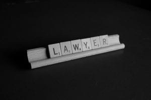 Scabble tiles in frame spelling out the word &ldquo;lawyer&rdquo;: image by Melinda Gimpel, via Unsplash.com.