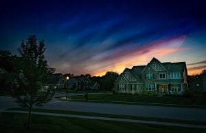 Grey wooden house at sunset; image by Kent Rebman, via Unsplash.com.