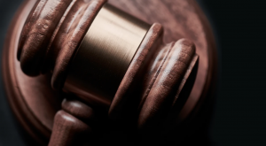 Close-up of gavel; image by Bill Oxford, via Unsplash.com.