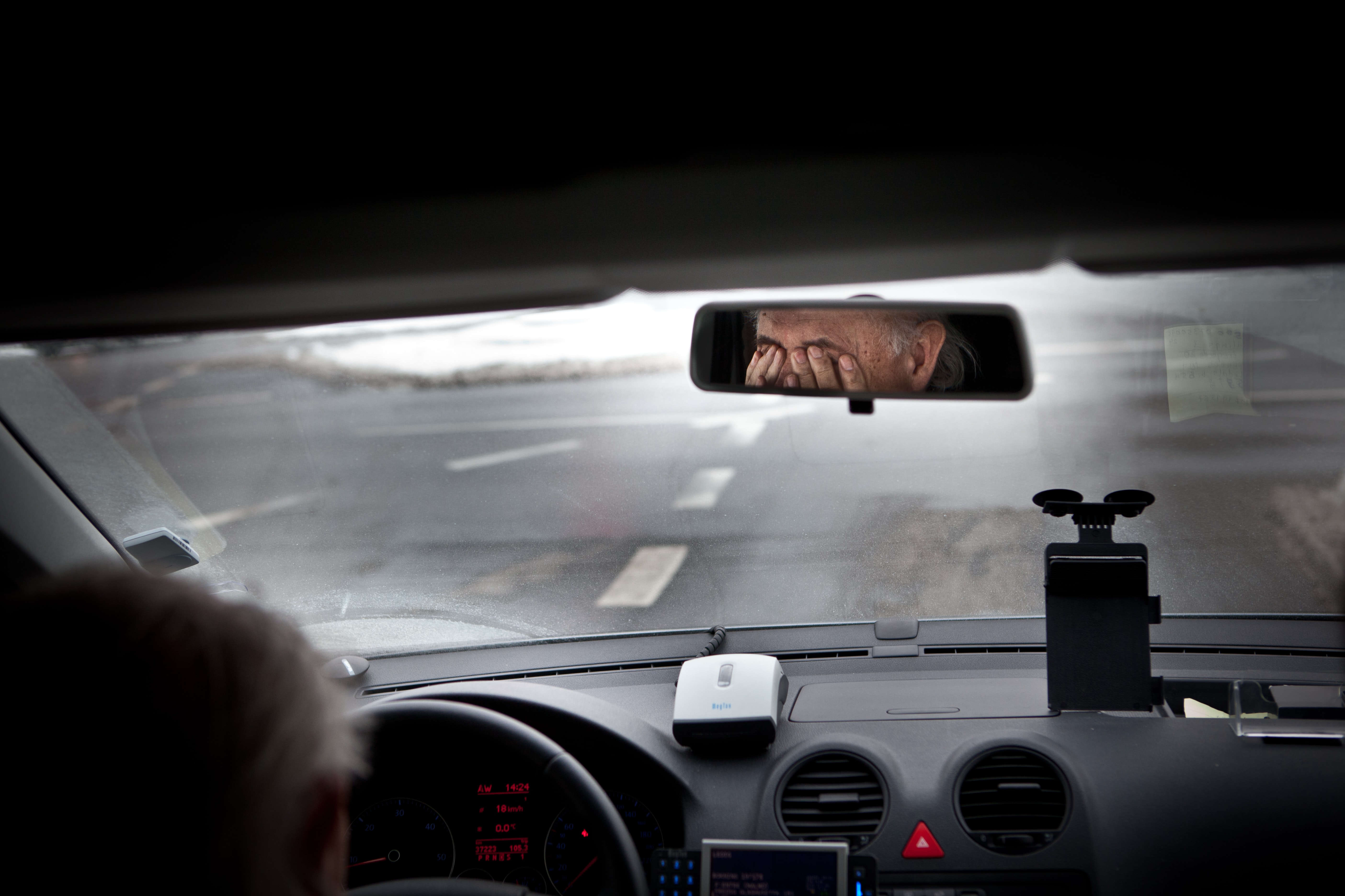 Tired driver; image by Johan Funke, via Unsplash.com.