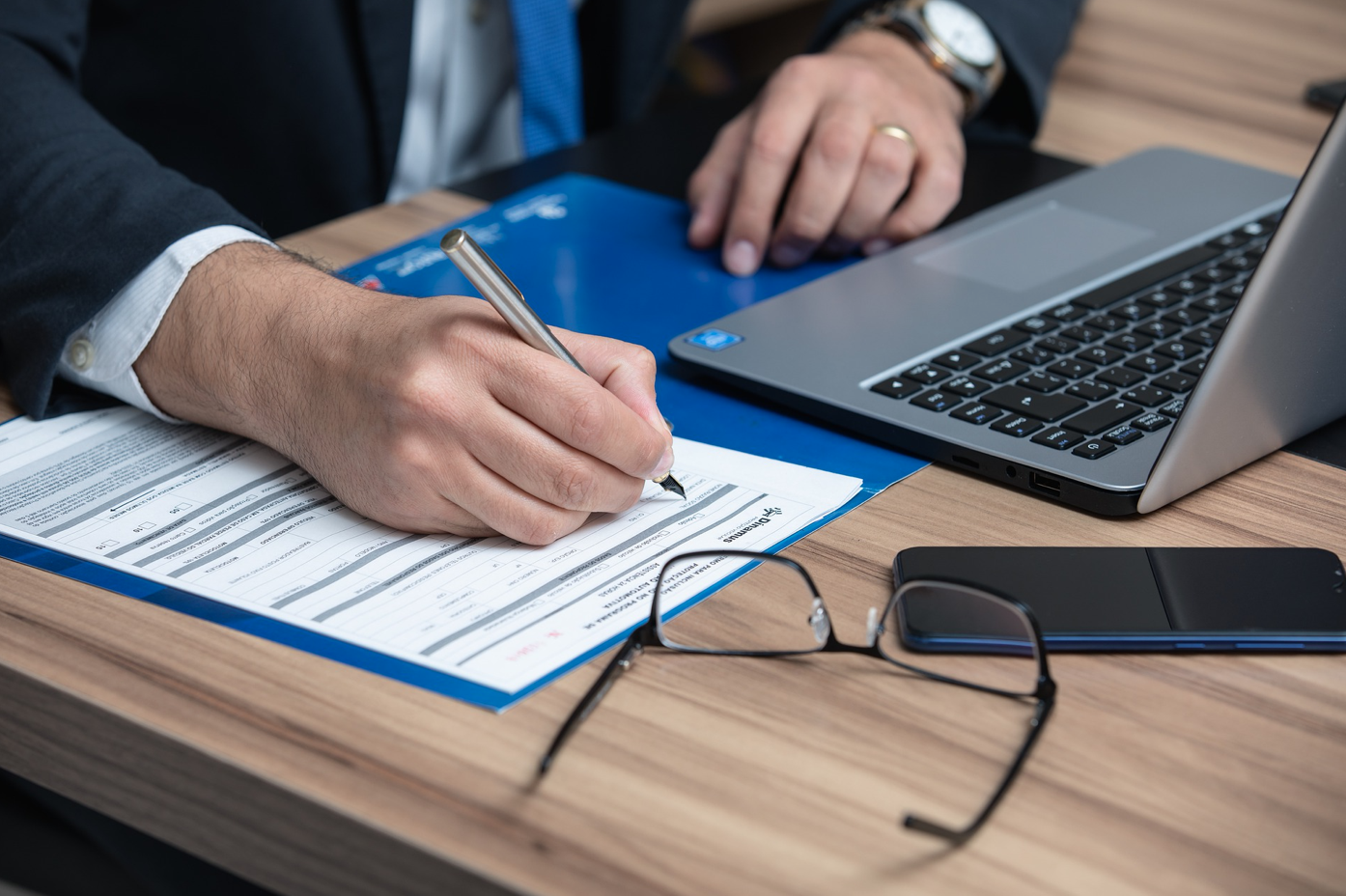 Lawyer preparing a file; image by advogadoaguilar, via Pixabay.com.