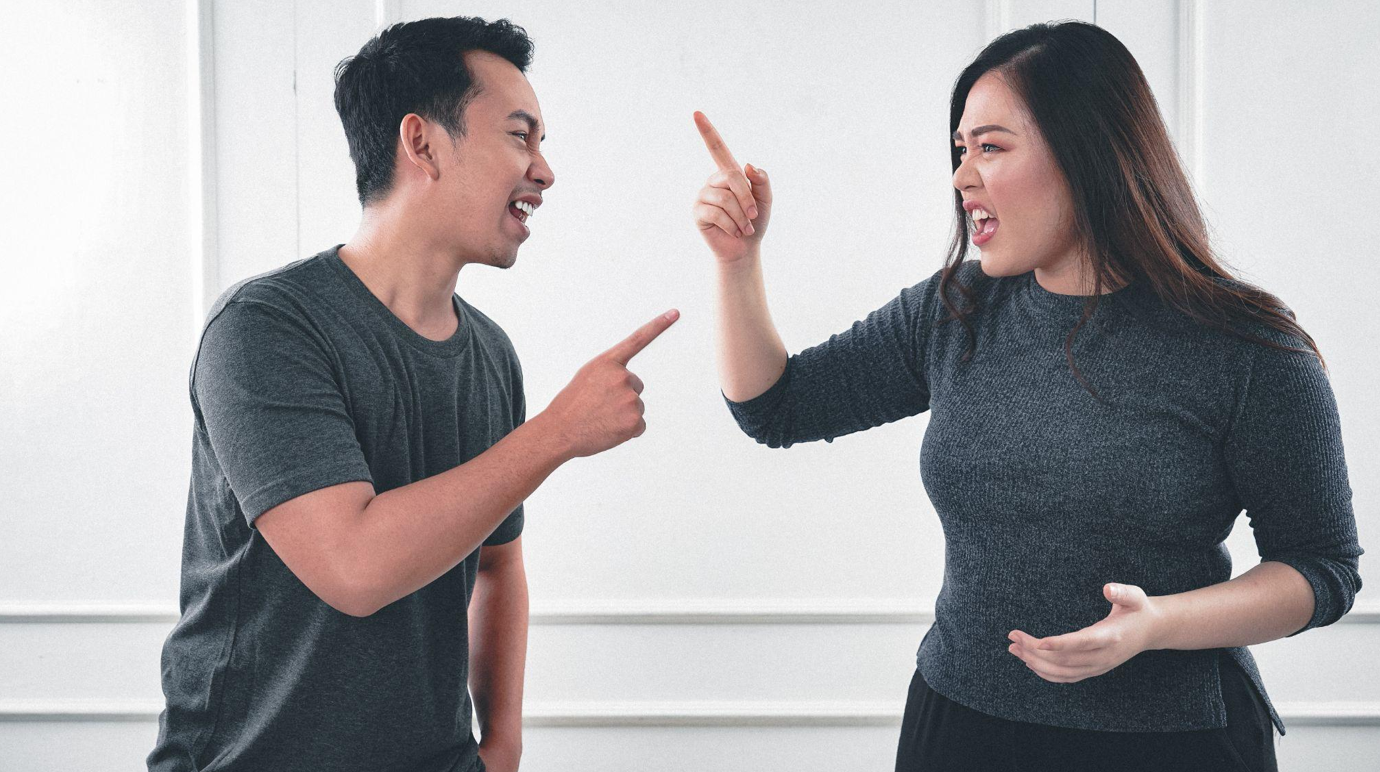 Arguing couple; image by Afif Ramdhasuma, via Unsplash.com.