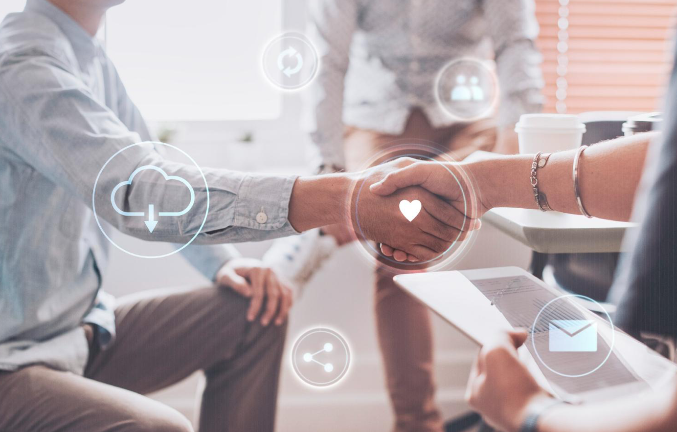 Business people shaking hands; image by Rawpixel.com, via Freepik.com.