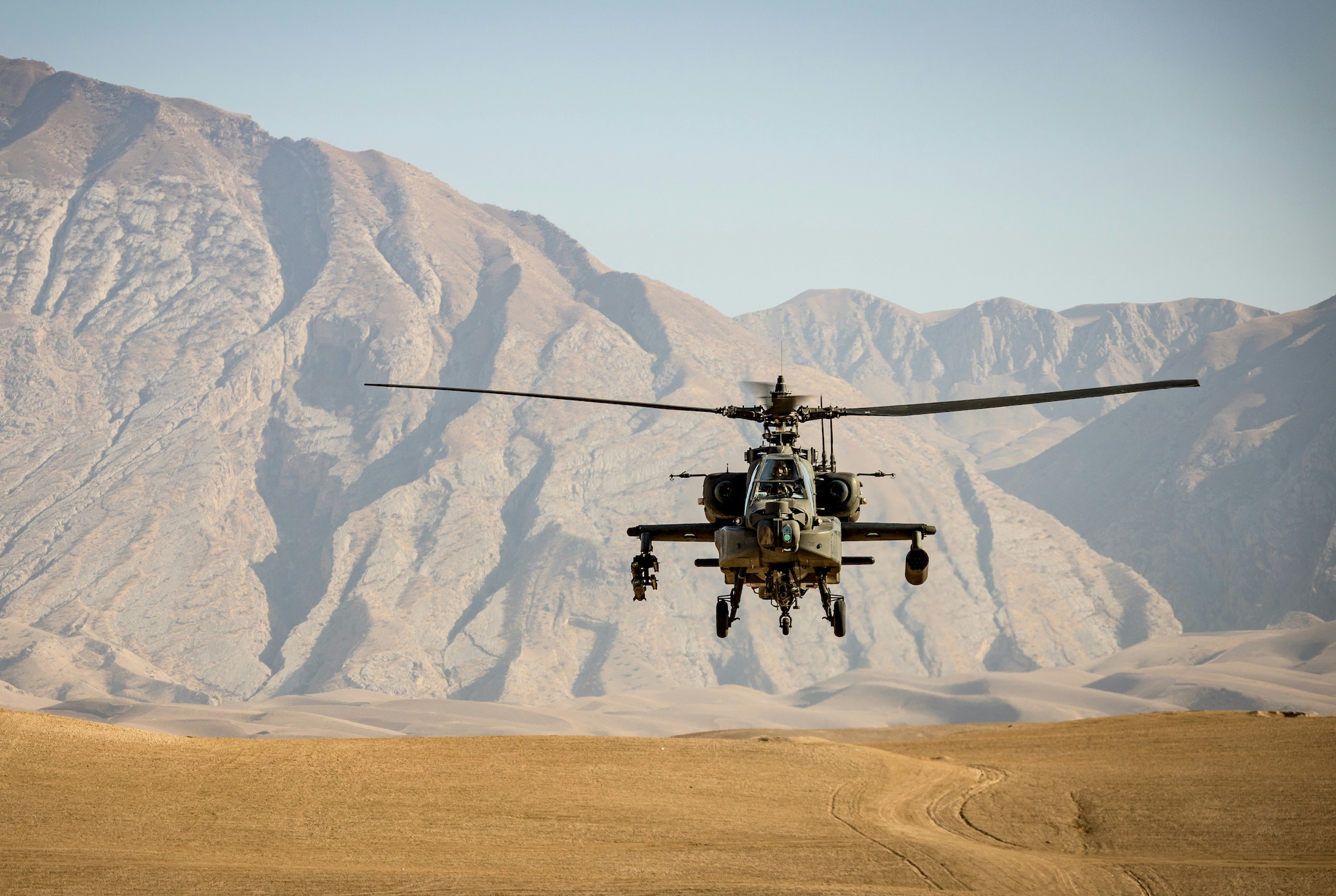 Military helicopter; image by Andre Klimke, via Unsplash.com.